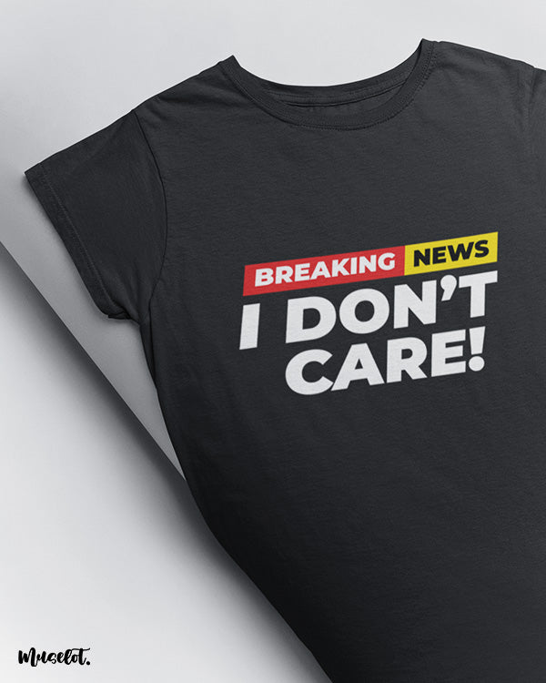 Breaking news I don't care printed t shirts for men and women in black colour