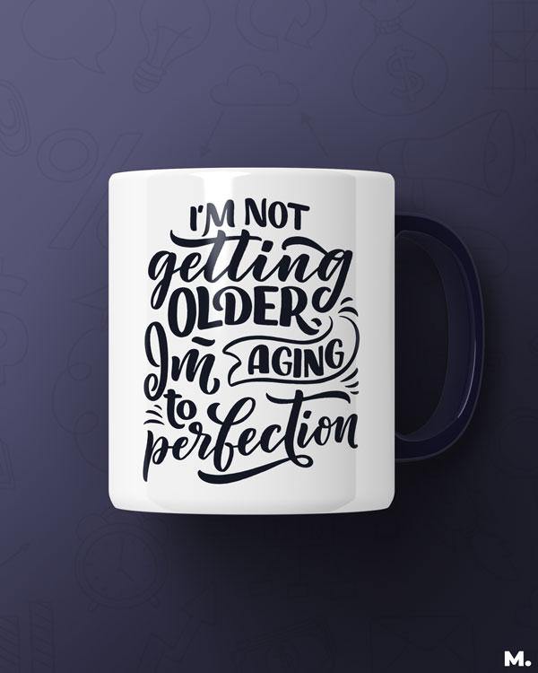 White Printed mugs online for moms - I am aging to perfection - MUSELOT