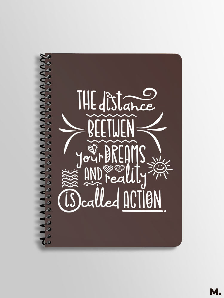 Printed A5 spiral notebooks for motivation printed with "the distance between your dreams and reality is action" MUSELOT