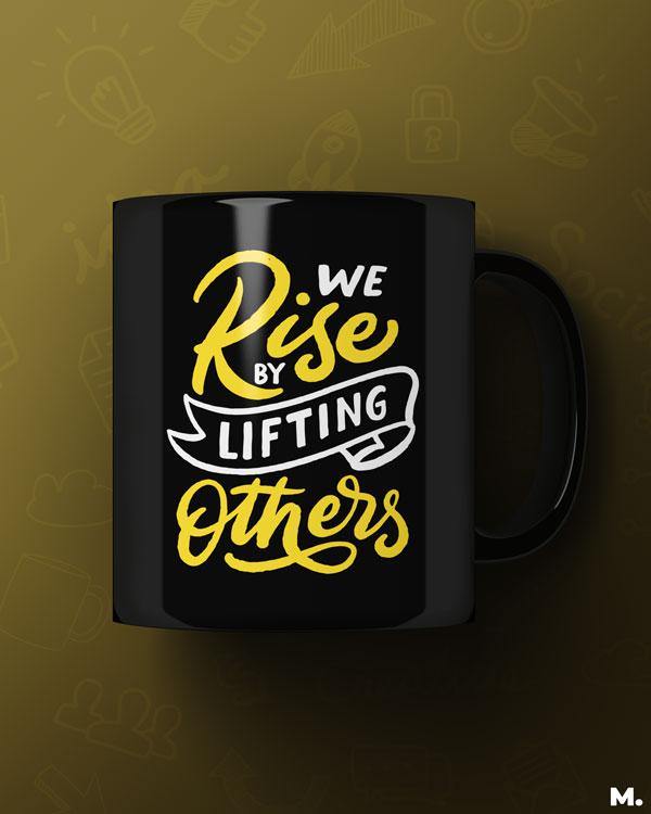 Black printed mugs online for social activists - We rise by lifting others - MUSELOT