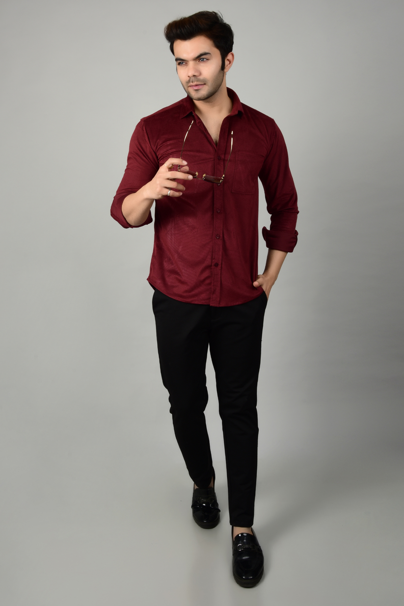 A maroon shirt with a black pant,highlighting the fashionable combination of the shirt-Muselot