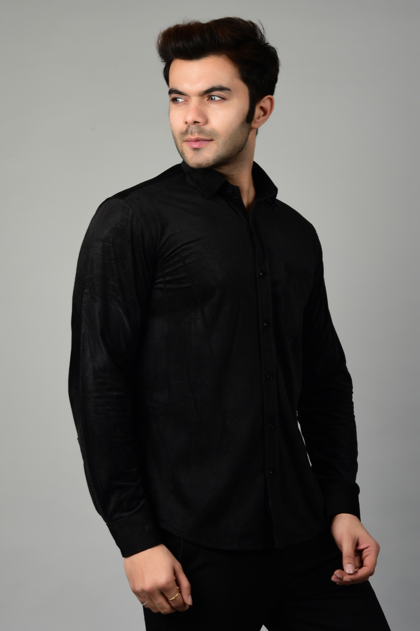 Side view of a black shirt,showcasing the stylish appearance of the shirt for all seasons-Muselot