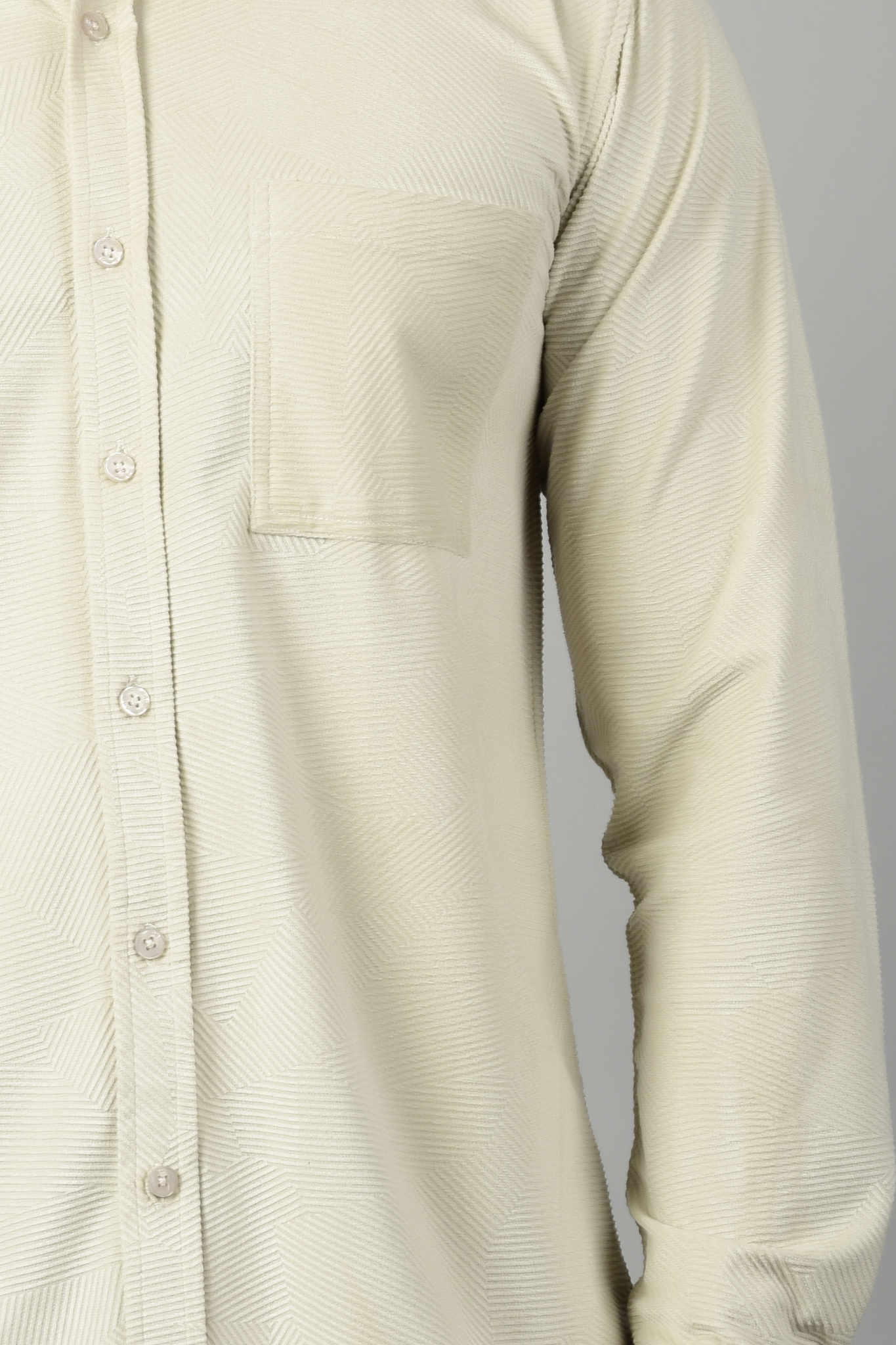 A close up view of a full sleeve cream shirt, highlighting a smooth texture and rich quality of the fabric-Muselot