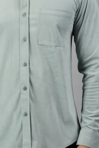 A close view of sky shirt, showcasing the rich quality and patterns of the fabric-Muselot