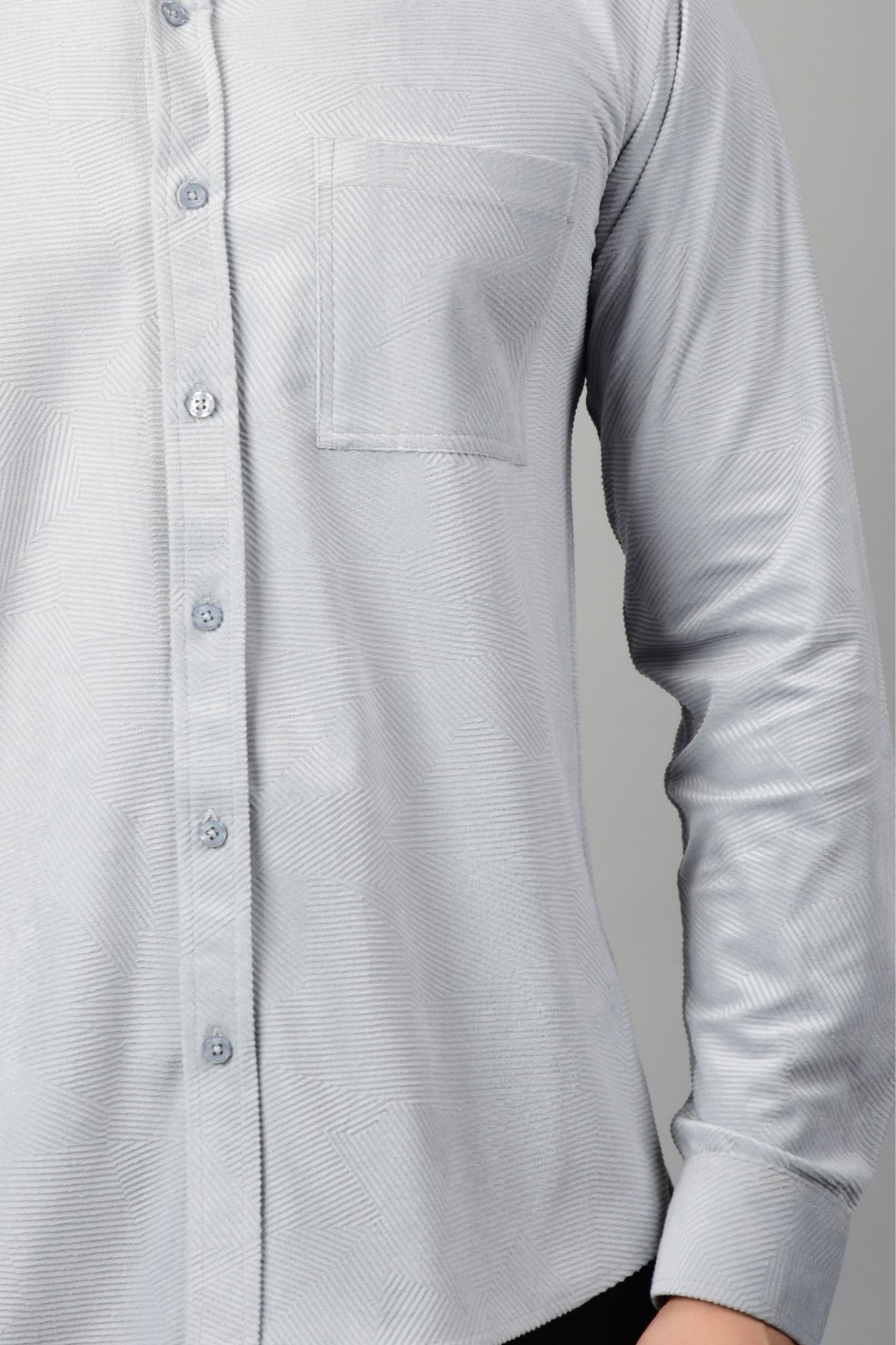 Close view of grey shirt,showcasing the pattern and texture of the shirt-Muselot