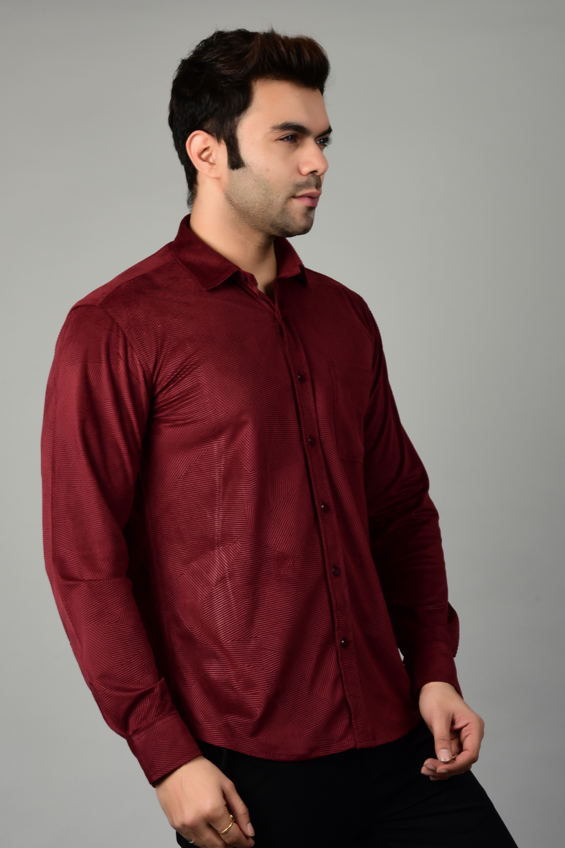 A side view of a maroon shirt paired with a black pant, showcasing the shiny fabric and texture of the shirt-Muselot