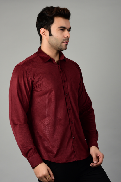 A side view of a maroon shirt paired with a black pant, showcasing the shiny fabric and texture of the shirt-Muselot