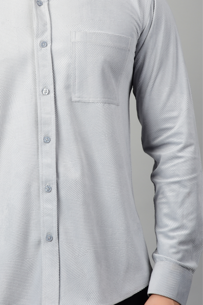 Close view of grey shirt,showcasing the pattern and texture of the shirt-Muselot