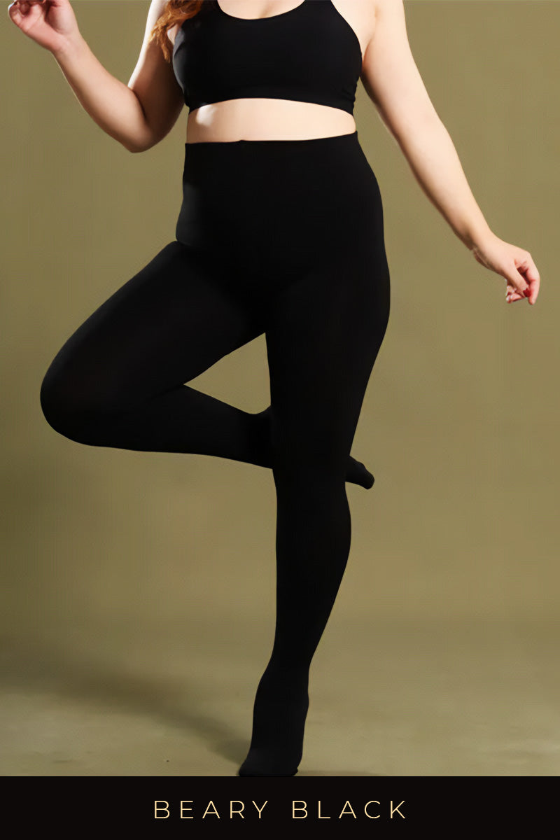 A model wearing black thermal tights showcasing smooth, opaque, and form-fitting,emphasizing their warmth and comfort - Muselot