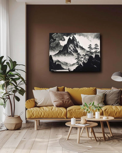 The monochrome mountains modern canvas art is mounted on a dark, plain wall, creating a striking contrast that enhances the artwork’s bold lines and shading. The dark backdrop emphasizes the black-and-white landscape, making it a dramatic focal point. Complementing the art, the surrounding furniture, adds to the room’s sophisticated and cohesive look-Muselot