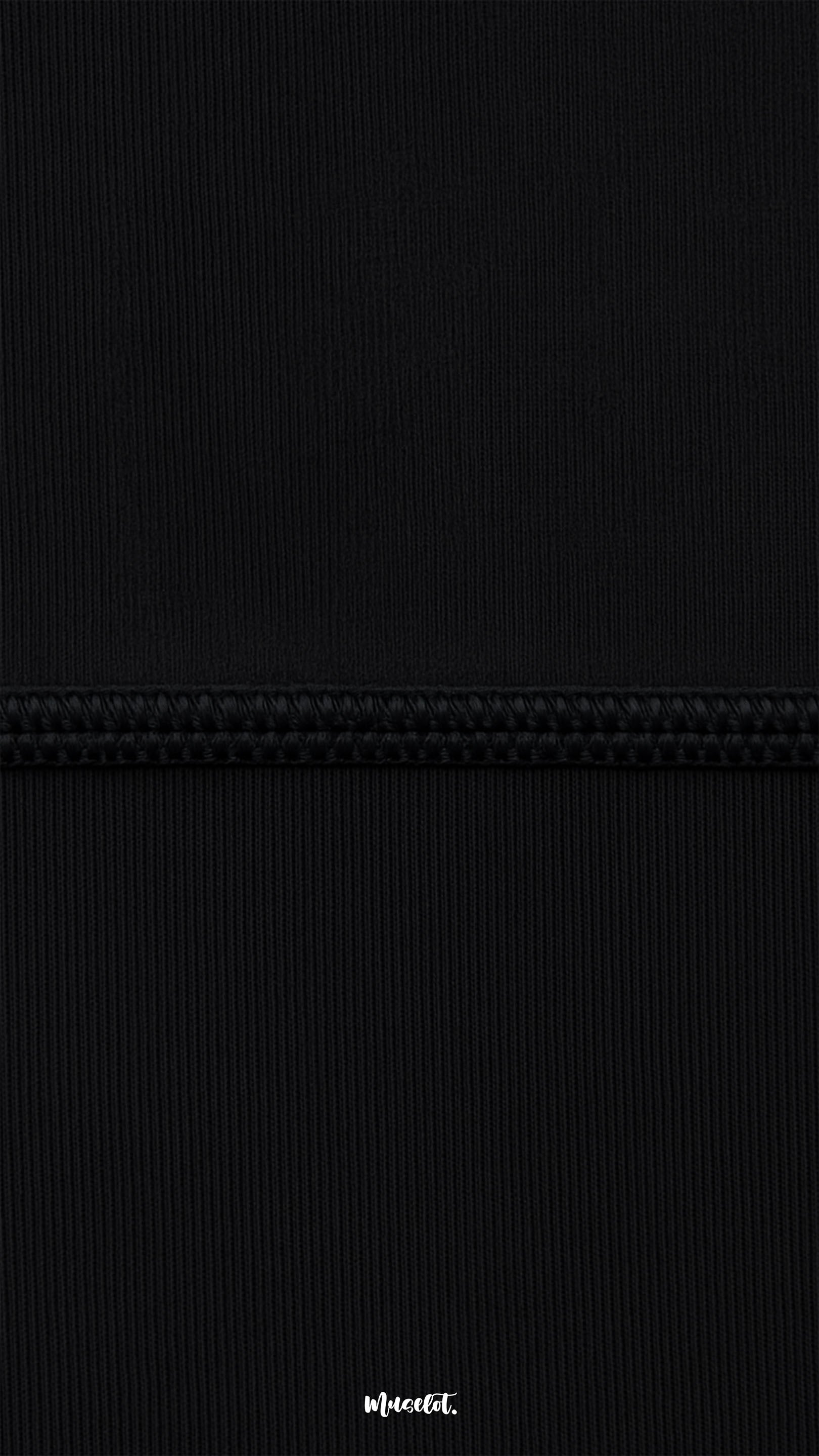 Macro close-up of black semi-opaque breathable tights with reinforced seam, showing fine ribbed texture, strength, and high-quality finish - Muselot