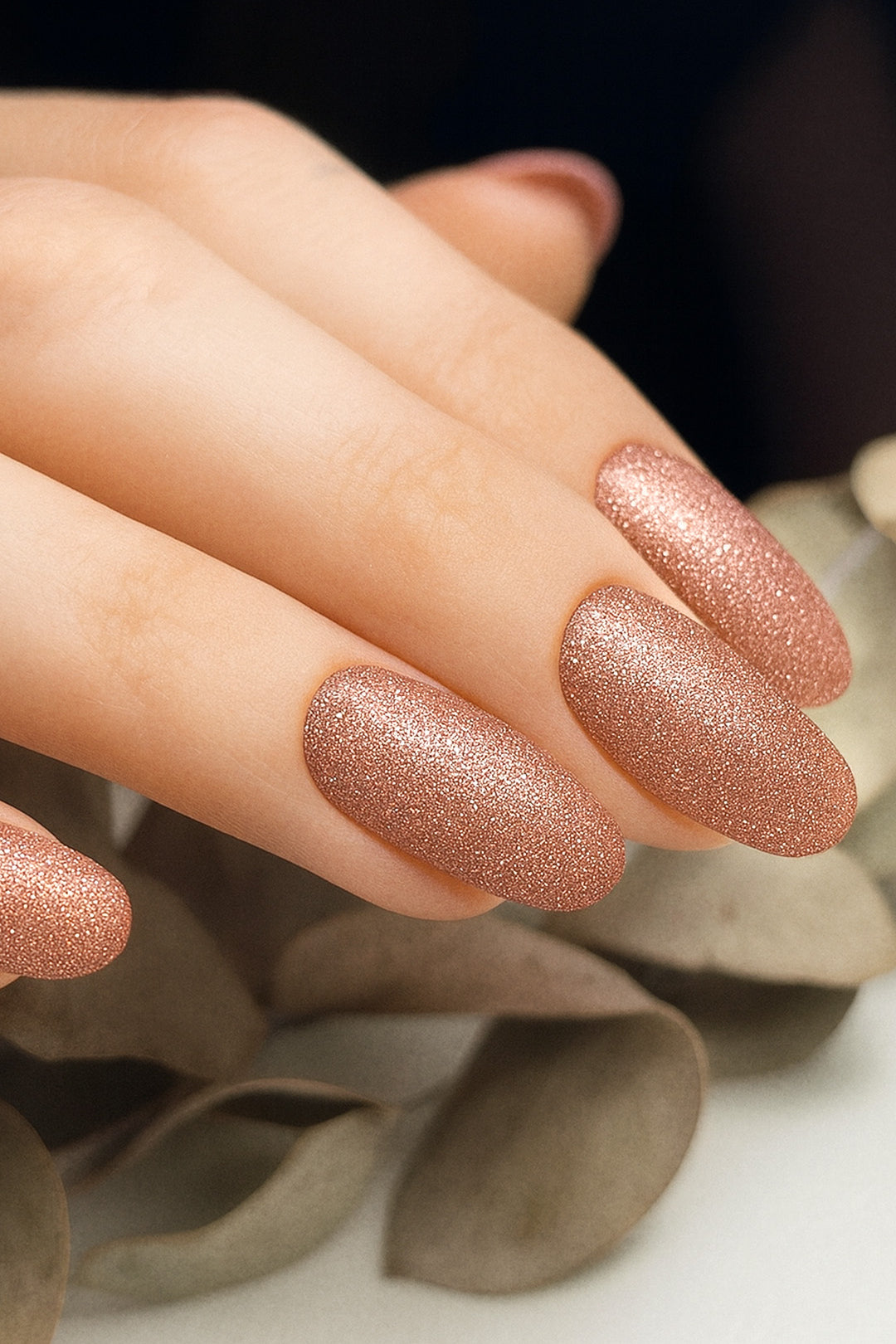 A close-up image of Caramel Glow Glitter nail art stickies, showcasing the warm caramel-brown shade with sparkling glitter accents, highlighting the glossy shine and effortless charm of simple glitter nail art for a salon-style finish – Muselot.