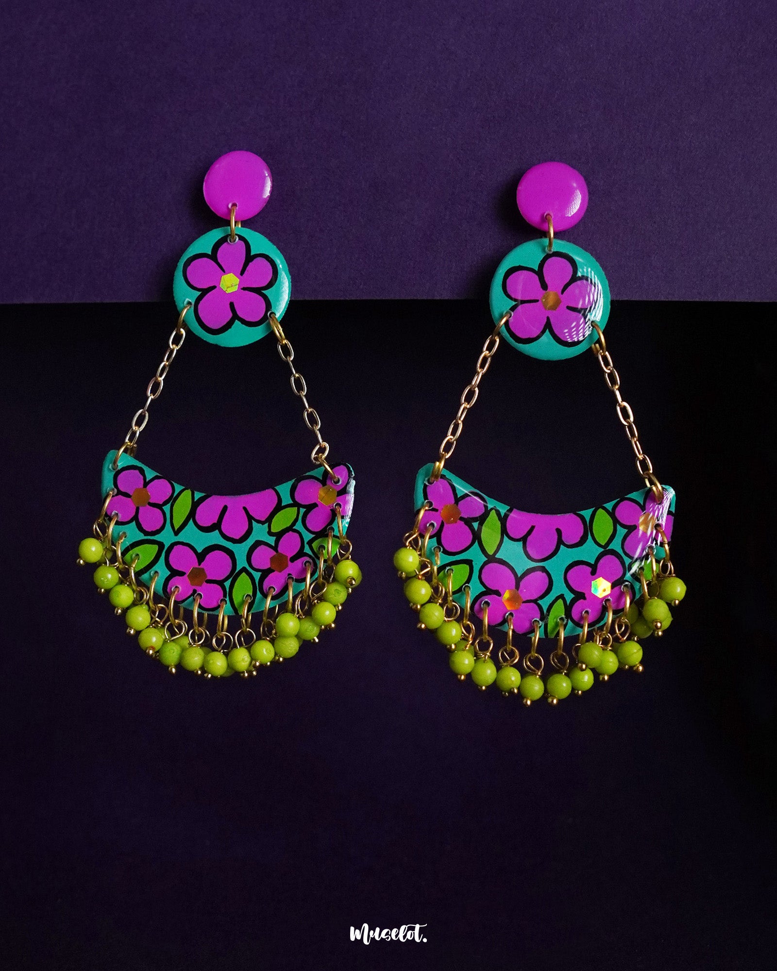 Gulbahar chandbali earrings featuring a vibrant mix of teal and magenta floral patterns with lime green bead drops, highlighting bold handcrafted details and showcasing their festive, playful charm — Muselot.