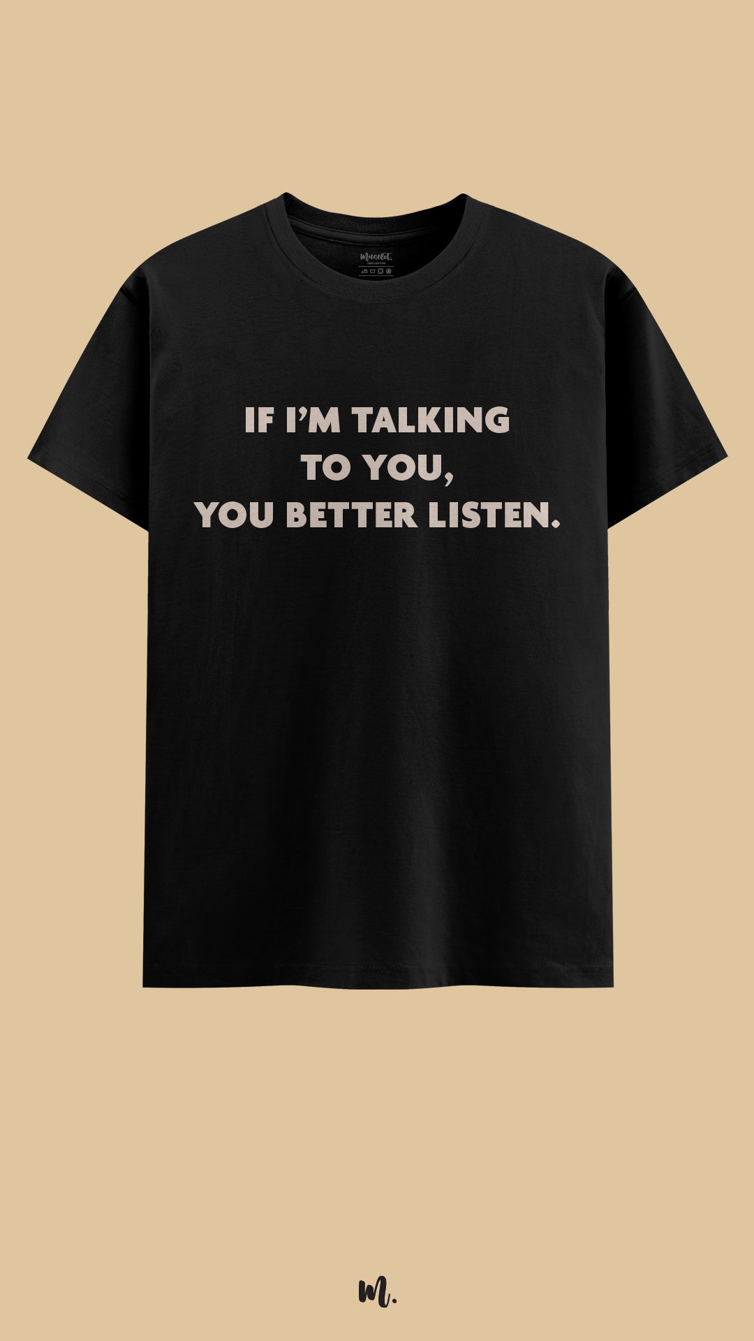 Black graphic t-shirt showcasing the “If I’m Talking to You, You Better Listen.” statement, highlighting a strong, assertive vibe perfect for statement streetwear against a clean, minimal beige background – Muselot