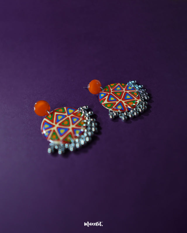 Multi-color Chakardi traditional earrings, displayed against a soft, neutral background, with vibrant shades and delicate craftsmanship that highlight the cultural richness and elegance of traditional artistry — Muselot.