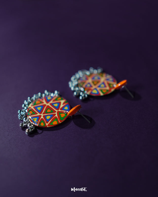 Multi-color Chakardi traditional earrings, set against a subtle background, with vibrant hues and delicate craftsmanship that highlight their rich cultural heritage and sophisticated charm — Muselot.