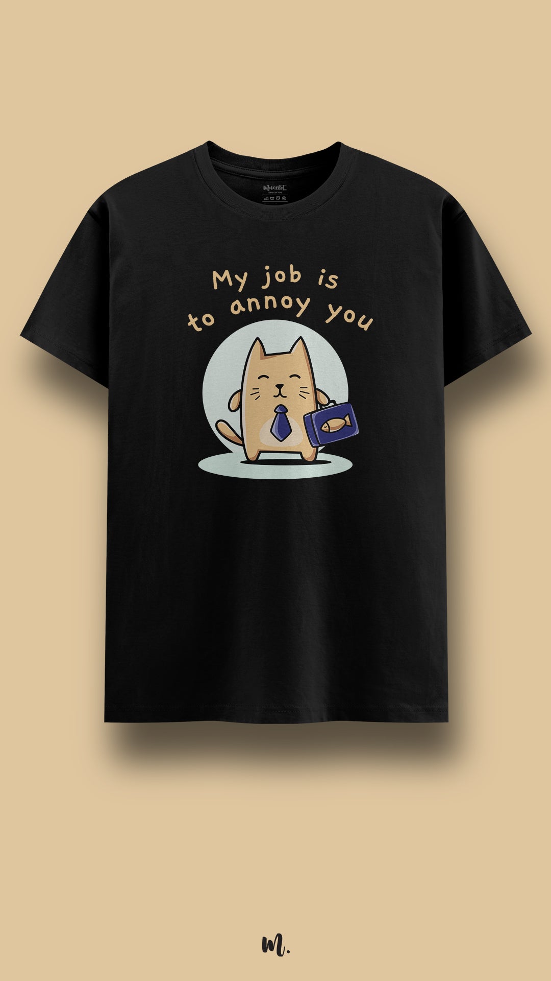 Black graphic t-shirt showcasing a cute cat illustration with the “My Job Is to Annoy You” statement, highlighting a quirky, humorous personality against a clean beige background – Muselot