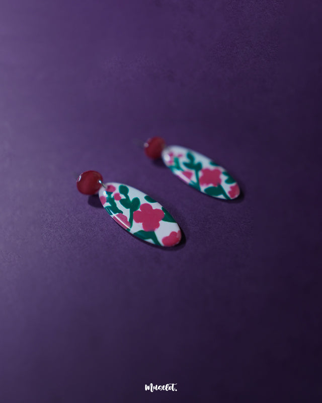 Close-up of the Nargis pink floral drop earrings with focus on the intricate flower details and pastel pink tones, highlighting the handcrafted finesse and lightweight design — Muselot.