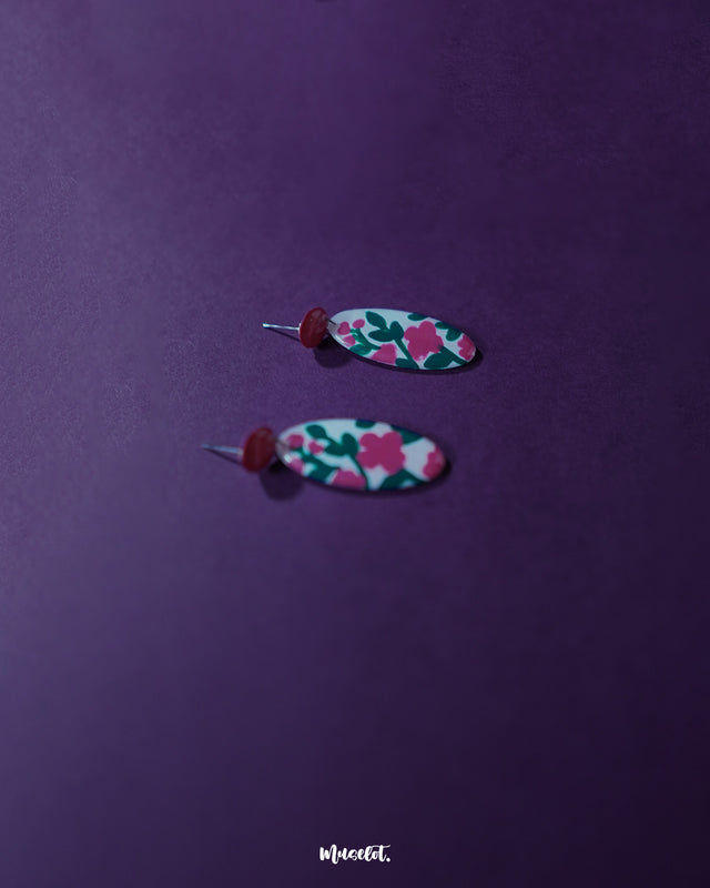 The Nargis pink floral drop earrings highlighting the handcrafted flower detailing and gentle color gradients that add a soft, feminine touch — Muselot.