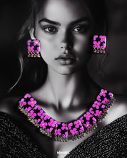 A stunning model showcases the Naubahar handmade floral necklace set, featuring delicate lavender flowers that elegantly rest against a purple backdrop. The intricate craftsmanship and charming design make this piece an ideal addition to any wardrobe, bringing a sophisticated and feminine touch — Muselot
