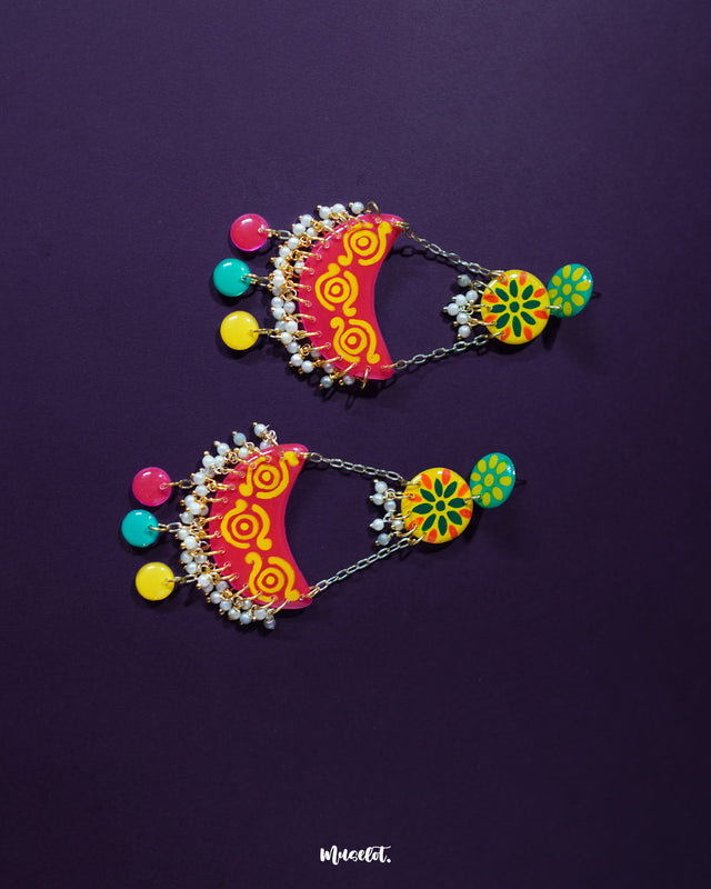 A rich celebration of culture and color, the Rangsiya colorful chandbali earrings feature radiant enamel work with tiny beaded accents and elegant crescent-shaped design — a perfect harmony of tradition and flair — Muselot.