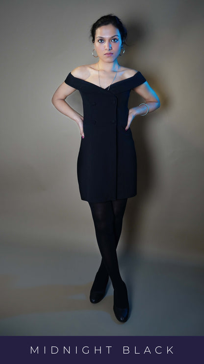 A woman standing with her legs crossed and her hands on her waist as she looks at the camera, wearing black stretchable stocking for girls, highlighting the smooth texture-Muselot