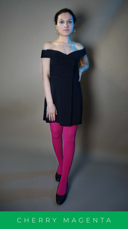 A model wearing hot pink tear proof stretchable pantyhose, posing with her head gently resting on her thigh and other on her waist as she stands slightly sideways, showcasing the breathable snug fit-Muselot