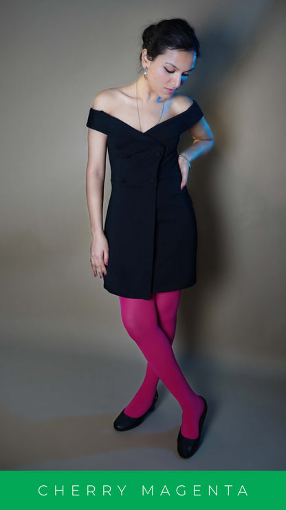 A woman wearing hot pink plus size stockings, posing with her hand on her waist and other hanging at her side, showcasing the voguish stylish look-Muselot