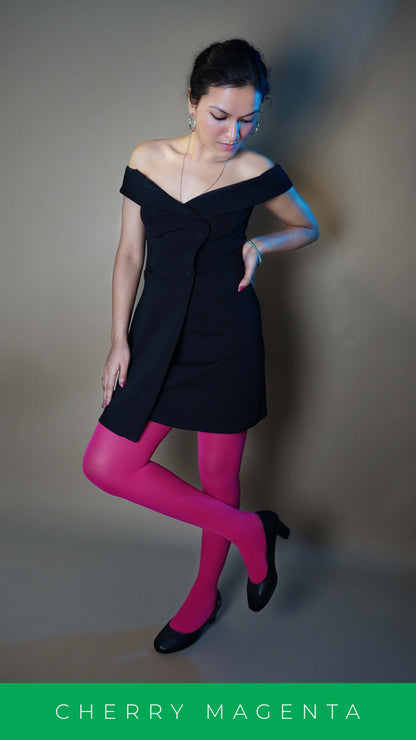 A woman wearing hot pink stockings for women, posing with her hand on her waist and other on her thighs, highlighting the modish trendy look-Muselot