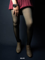 A close view of a model legs showcasing the sheer and smooth look-Muselot