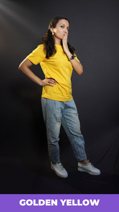 A woman in a cute pose wearing women's plus size plain cotton stretchable golden yellow T shirt-Muselot