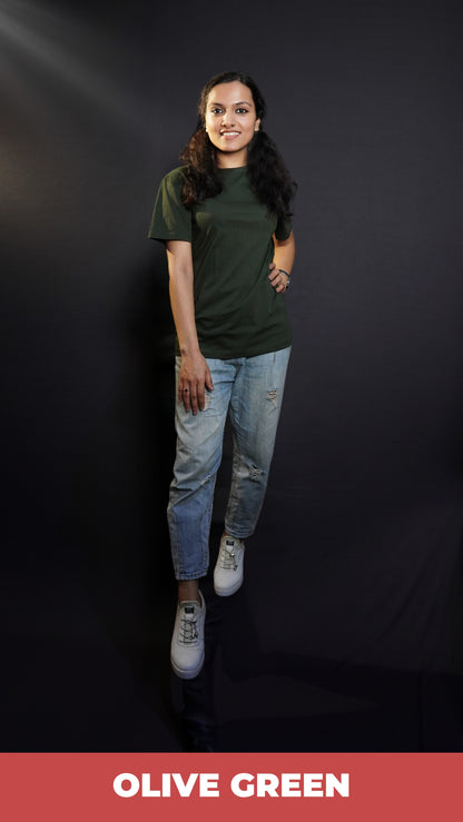 A stylish model wearing a short sleeved quick drying long length olive green t-shirt, posing with her hand on her waist and other on her thigh, showcasing a fashionable easygoing fit-Muselot