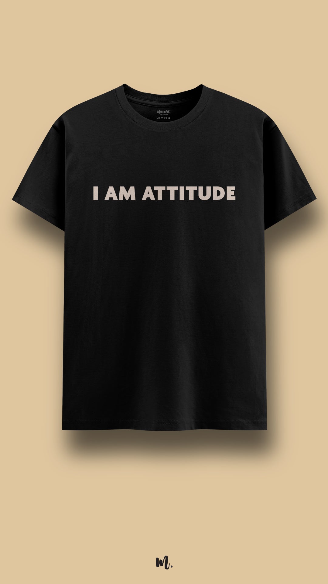 Black graphic t-shirt showcasing the “I Am Attitude” statement, confidently showcased against a clean beige background – Muselot