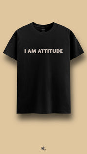 Black graphic t-shirt showcasing the “I Am Attitude” statement, confidently showcased against a clean beige background – Muselot