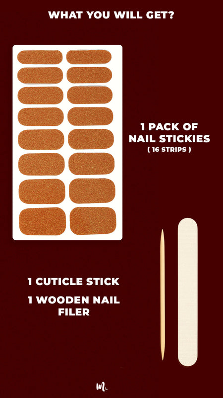 Warm Gold glitter nail art stickies pack, showcasing the full kit with 16 golden glitter strips in assorted sizes, a cuticle stick, and a wooden nail filer, highlighting everything included to create an easy salon-style manicure at home – Muselot.
