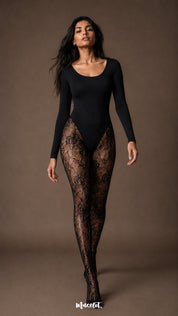 Full-length front view of a woman wearing black floral lace stockings featuring large rose motifs, fine semi-sheer mesh and waist-to-toe coverage-Muselot
