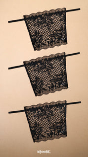 Three black lace clip-on neckline covers displayed on a beige background, featuring intricate floral lace patterns, adjustable straps and elegant scalloped edges. Designed for deep neck tops, dresses and blouses, these lightweight mock camisole inserts provide customizable neckline coverage while adding a sophisticated layered look with comfort and versatility – Muselot
