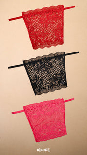 Three floral lace deep neck cover-up camisoles in red, black and dark pink displayed on a beige background, highlighting bold colour choices, delicate lace craftsmanship and stylish layering options for low-neck dresses, tops, blouses and partywear outfits – Muselot