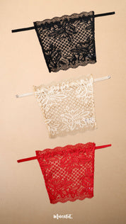 Three lace clip-on neckline covers in black, beige and red displayed on a beige background, showcasing intricate floral lace detailing, adjustable straps and versatile styling options. These deep neck cover-ups add elegant neckline coverage to dresses, blouses and low-cut tops while offering a lightweight, breathable alternative to traditional camisoles – Muselot