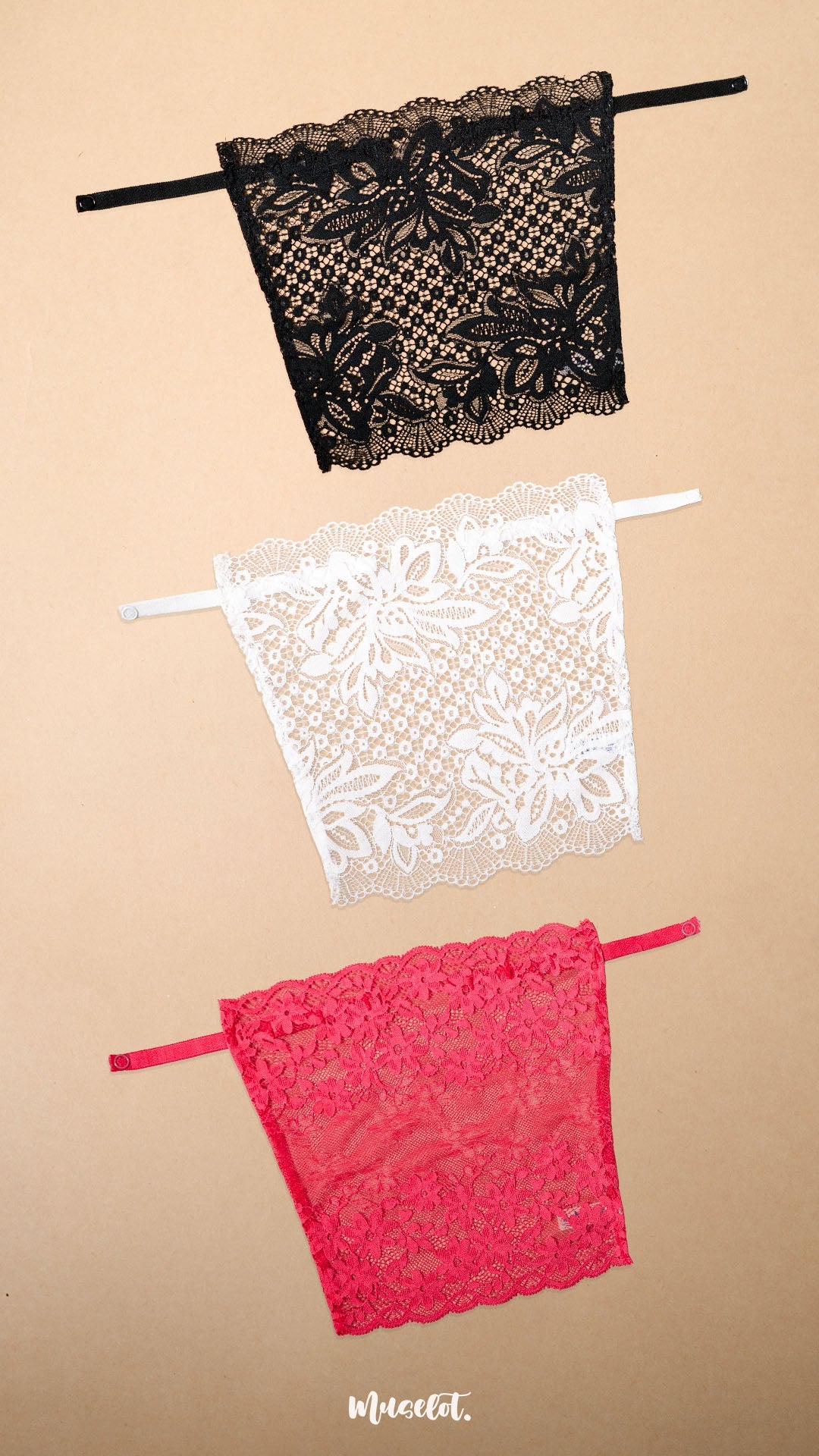 Three lace neckline cover-ups in black, white and dark pink displayed on a beige background, showcasing vibrant colour choices, intricate floral lace patterns and elegant styling options for deep neck tops, dresses and blouses – Muselot