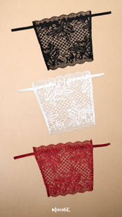 Three floral lace deep neck cover-up camisoles in black, white and maroon arranged on a beige background, showcasing versatile colour options for neckline coverage, layering and styling with dresses, tops and blouses – Muselot