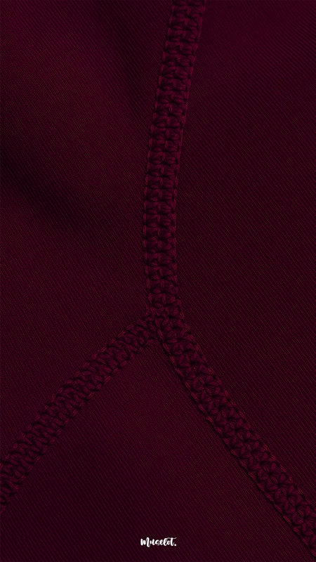 Close-up of double-stitched seam on maroon opaque tights, highlighting durability, reinforced strength, and premium craftsmanship - Muselot