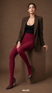 Front seated view of maroon fur lined stockings for women showing opaque thermal coverage and full closed-foot design - Muselot