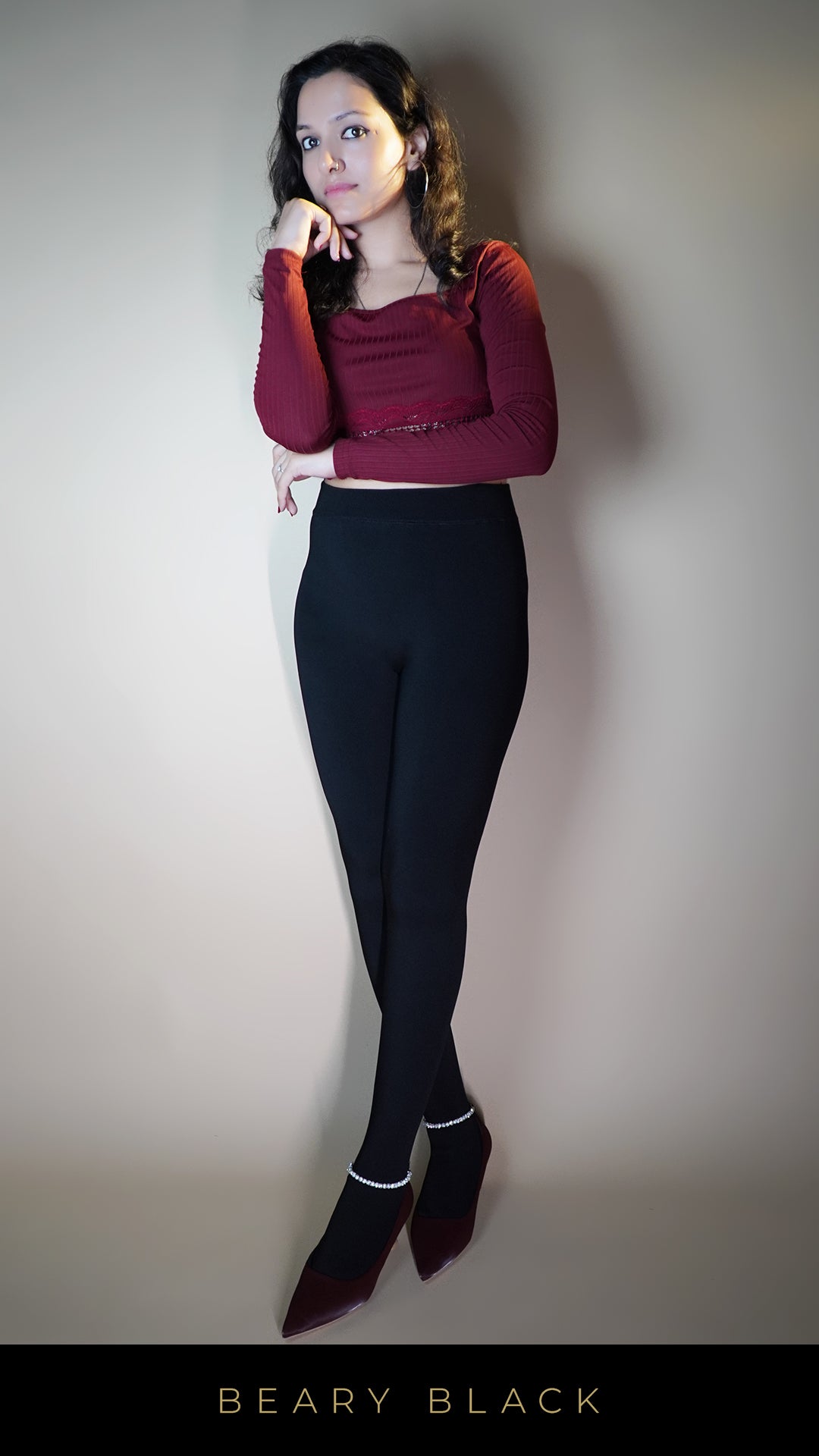 A  beautiful model, wearing fur-lined warm tights, showcasing their plush, insulating fabric that provides exceptional warmth and comfort, highlighting a perfect balance of style and functionality for chilly weather. -Muselot