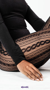 A angled close up of black net tights on white background, showcasing woven fishnet pattern and stretchable stocking fabric for everyday styling – Muselot