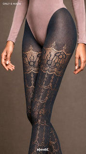 Close-up shot of a Intense Grey designer lace pantyhose highlighting the detailed ornamental thigh motif and delicate semi-sheer mesh finish - Muselot