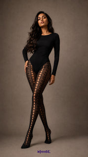 Full-length model wearing black semi-sheer designer lace stockings with decorative openwork side detailing, intricate fishnet pattern and covered toes.