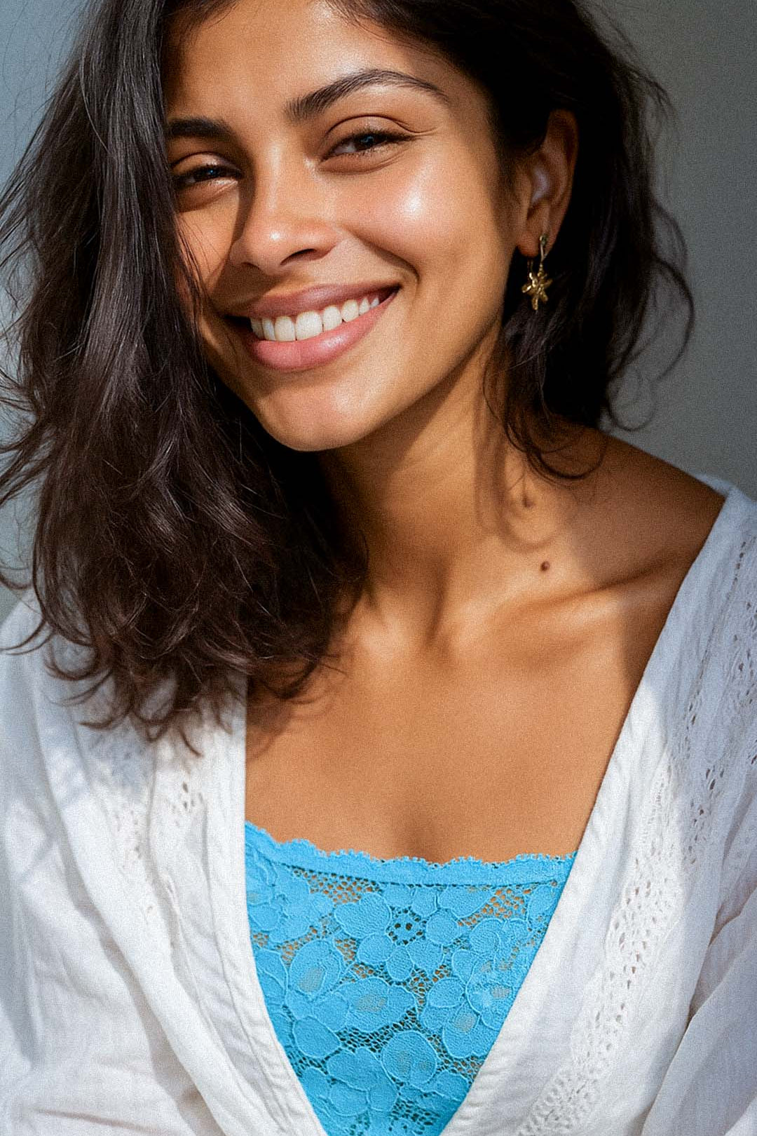 mocker-NeonBlue-lace-worn-model-smiling.jpg