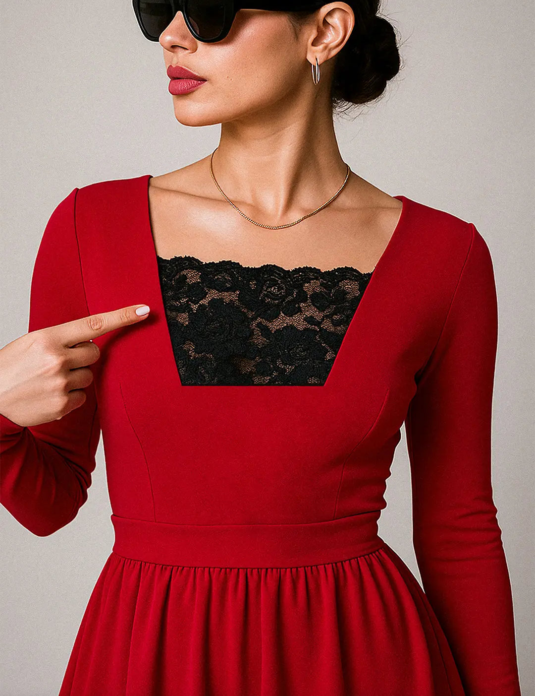 Model wearing Lacy Black Mockers with a red dress, showcasing the delicate lace detail and striking contrast that enhances deep-neck outfits – Muselot.