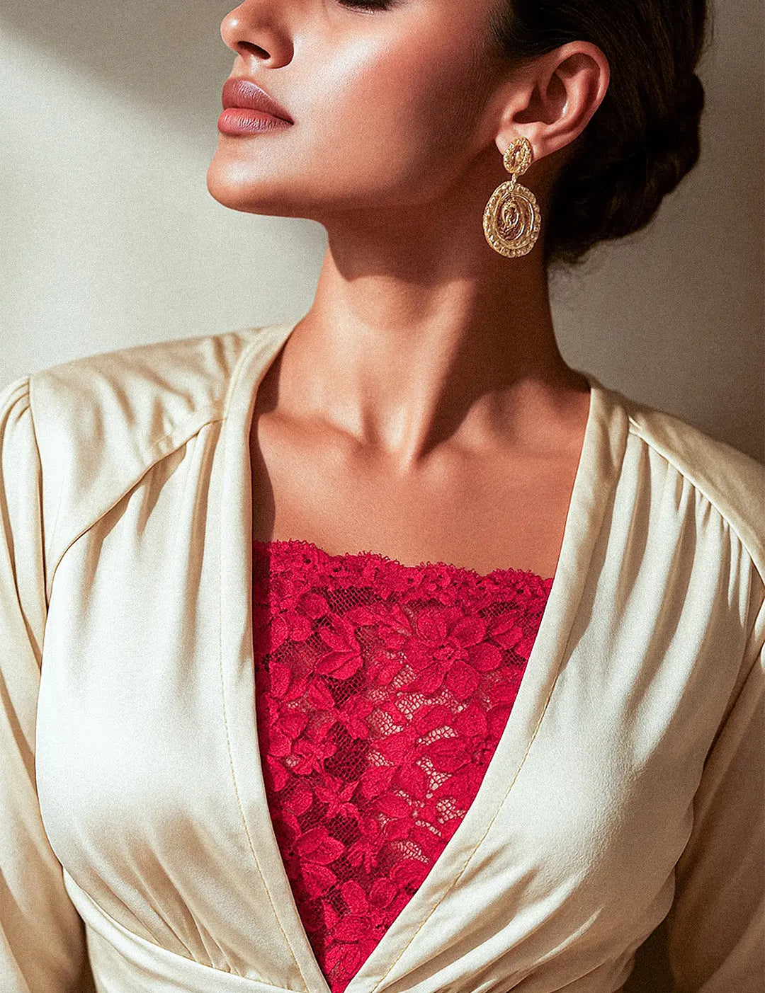 Sunlit shot of model wearing Lacy Red Mockers with a beige dress, highlighting the rich lace texture and elegant contrast for deep-neck styles – Muselot.